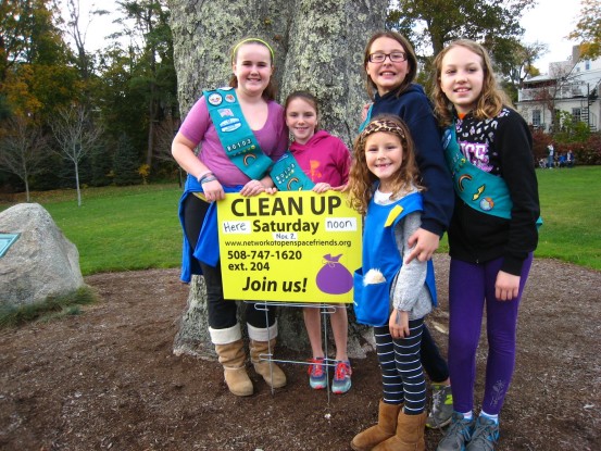 Local Girl Scouts cleaning alongside Town Brook