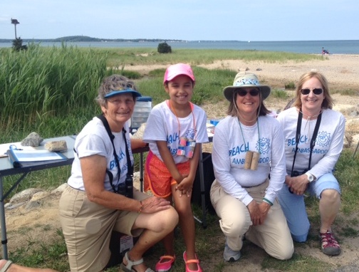 Four beach ambassadors on beach