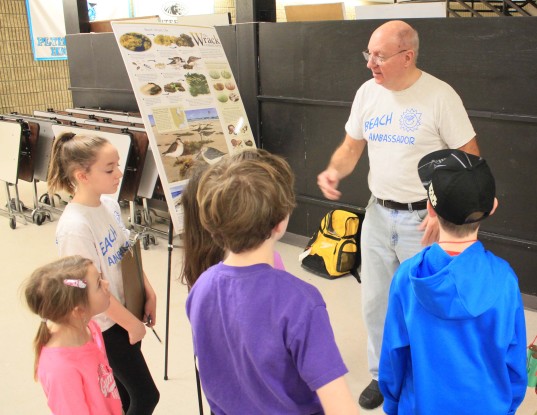 Paul explains Wrack Attack to an entranced audience.